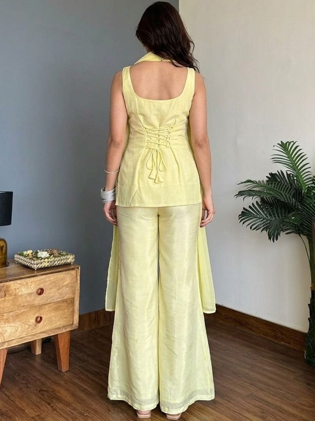 Pastel Lemon Yellow Embroidered Sleeveless Short Kurta Sharara Suit Set
